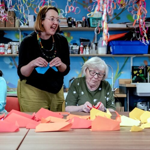 Visual artist Rachel Fitzpatrick with some participants of Brain Injury Matters Northern Ireland